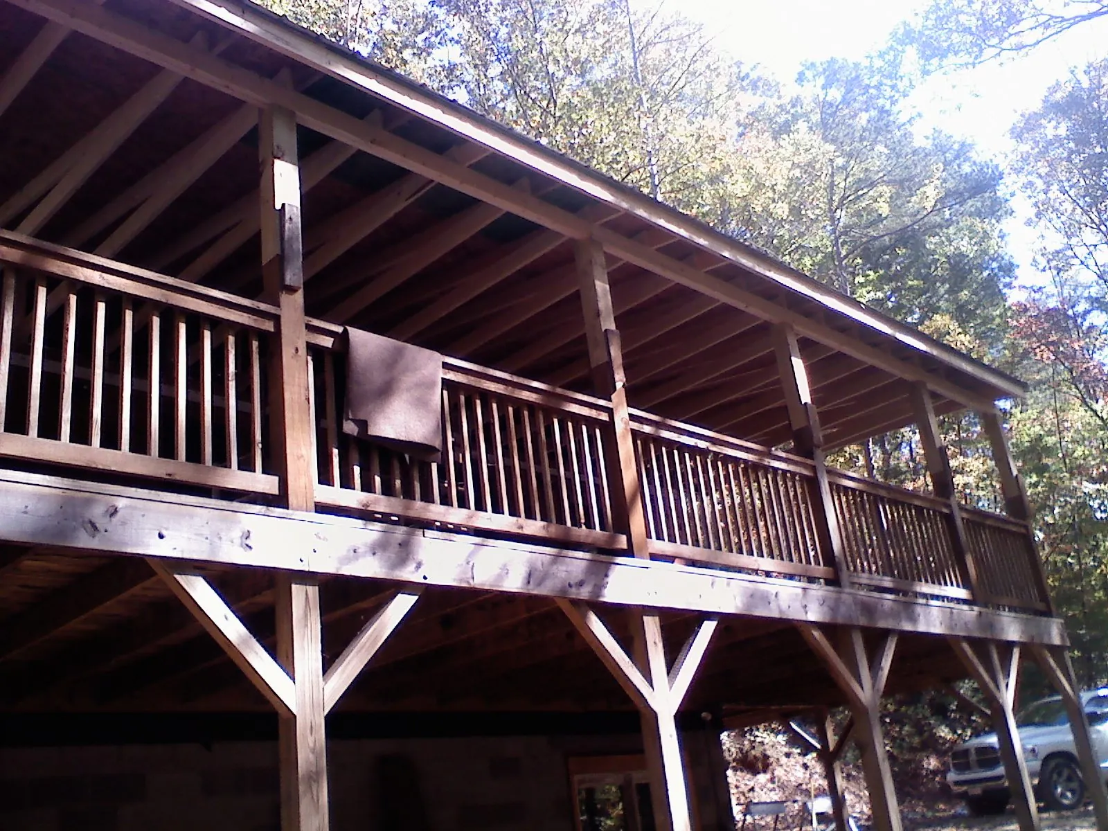 Timber framing under a new elevated porch and deck — Roof Leak Repair in Bayonne by Roofing Brothers